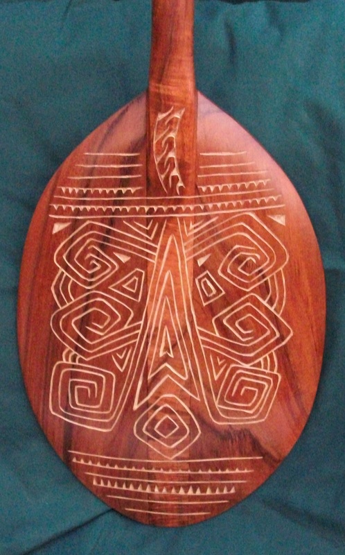 Authentic Hawaiian Koa paddles made by master woodcarver 